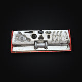 Mac Tools PS958 box open showing the complete slide hammer puller set seated in the original foam tray