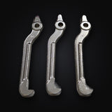 Three Mac Tools PS958 puller jaws removed from the foam tray showing straight unmarked hooks